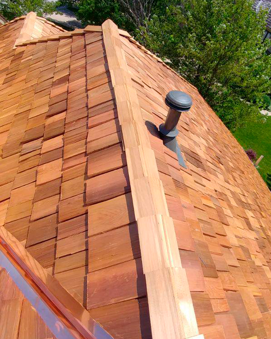Wood shake roofing is a sustainable and eco-friendly option for those who prefer a natural aesthetic. It's made from cedar, redwood, or pine or cypress trees, making it renewable and